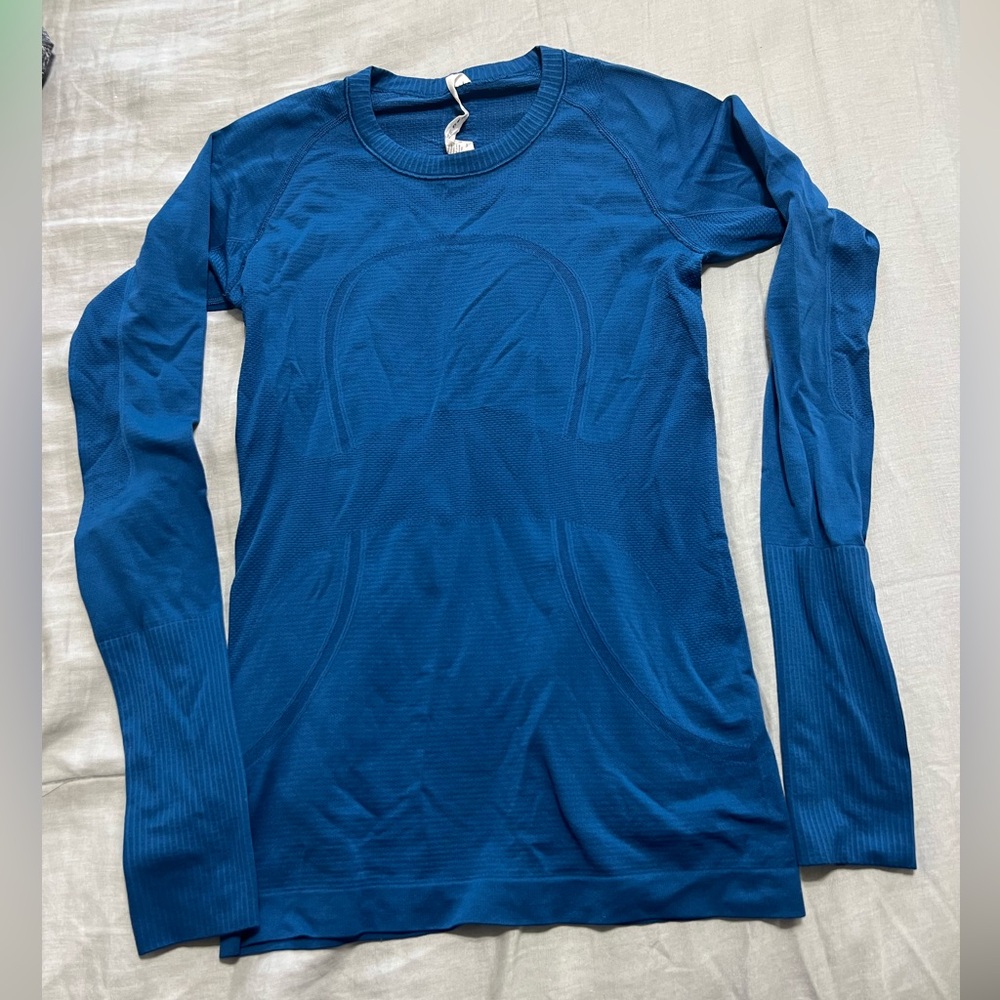 Lululemon Long Sleeve Teal Swiftly Tech, size 6, $30
